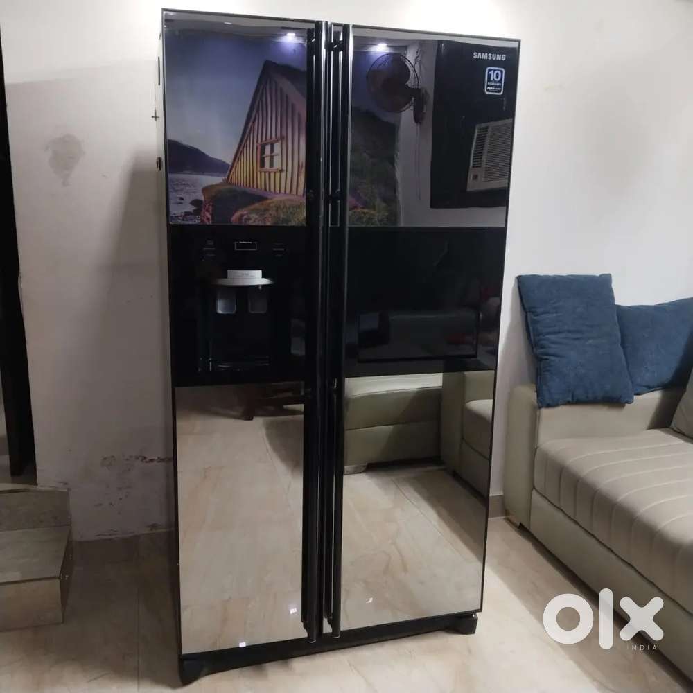 For sale 600 L samsung side by side fridge with water and ice dispense