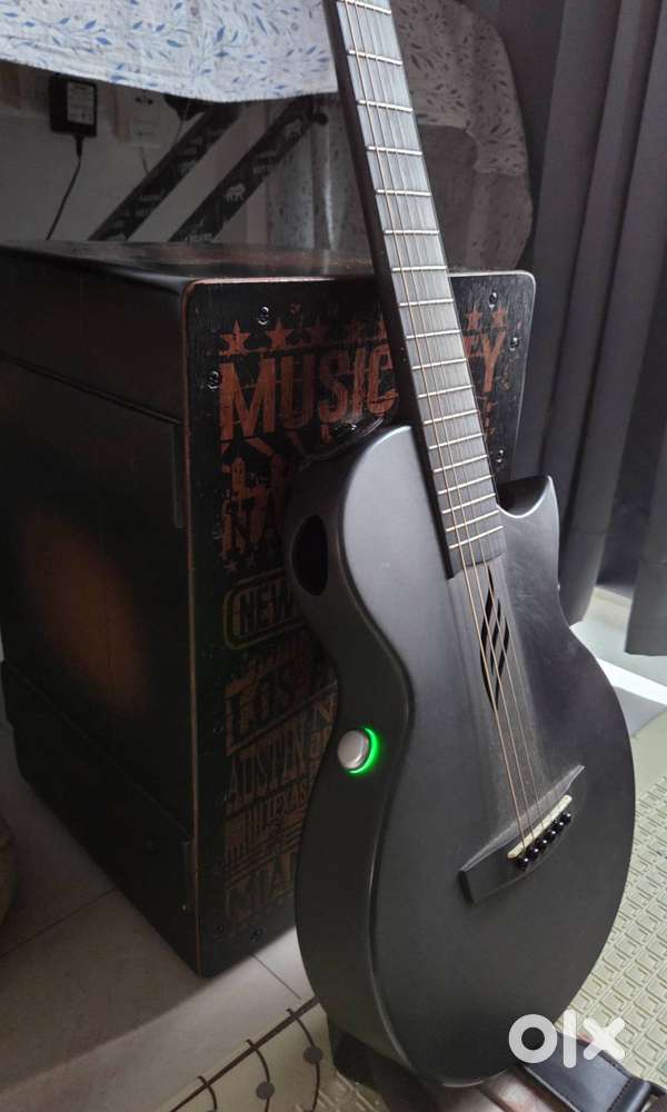 Enya Accoistic electric guitar with inbuilt Amplifier