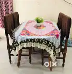 Dinning table and a wooden cupboard