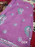 A heavy embroidery work saree