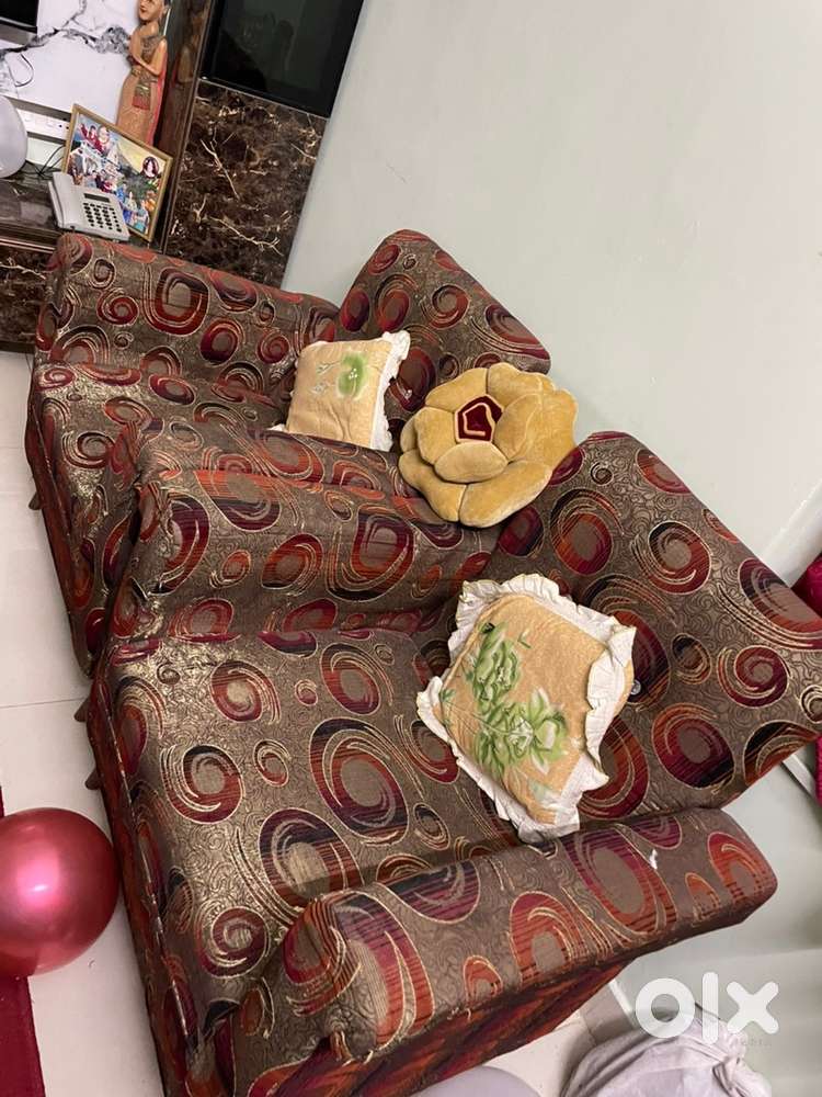 A cushion fitted pure teak wood sofa set