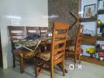 Wooden sinning table with glass top