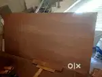 Plywood sheet and cut piece of plywood sheet