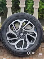 Suzuki Fronx top model 16 inch alloys.