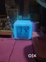 Digital alarm clock with colour with three cells and they are new