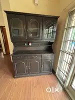 Full size side board in wood with glass doors