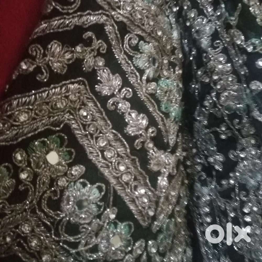 Gown dark green stone work marrage wear