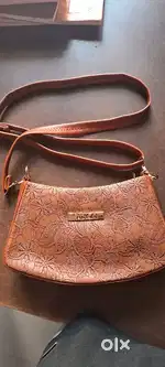 Sling bag (brown colour)