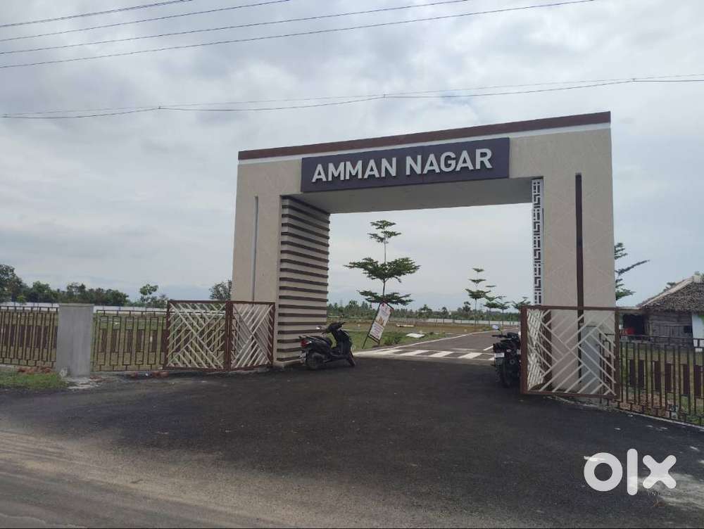 Gated community layout, black‑top roads,stree lighting, cctv/security
