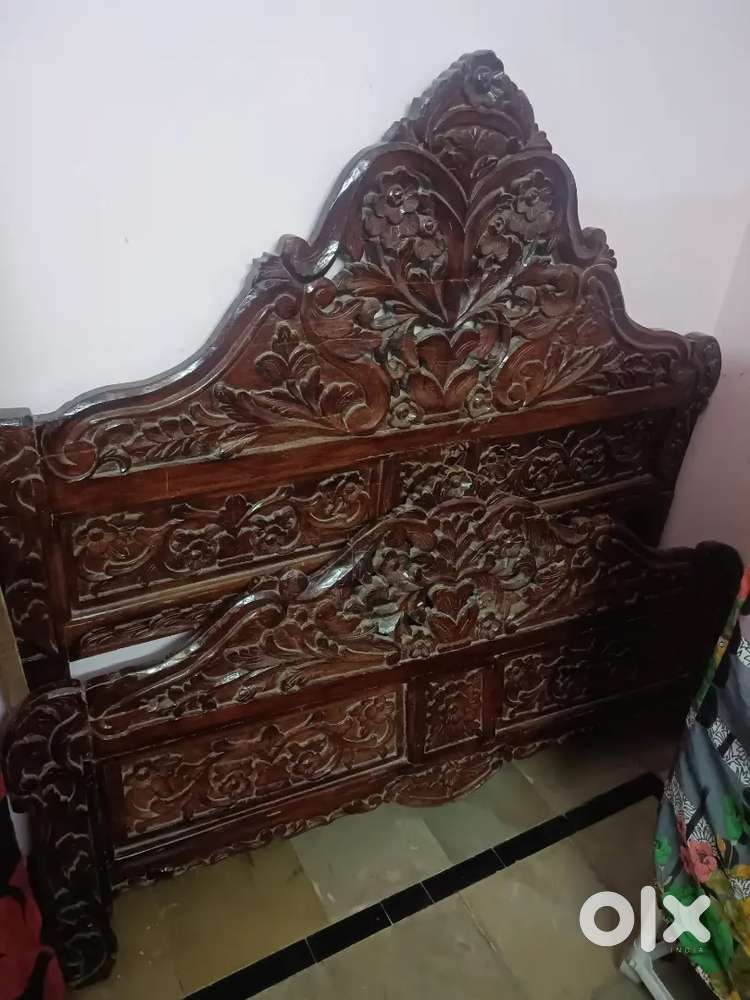 Wooden bed with all they parts...