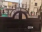 Kothi. Main iron gate