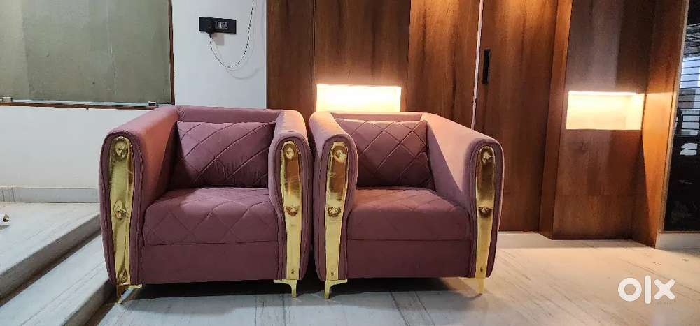 Two single seater sofas