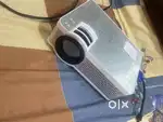 Projector you can watch any thing on it like cricket match , movie and