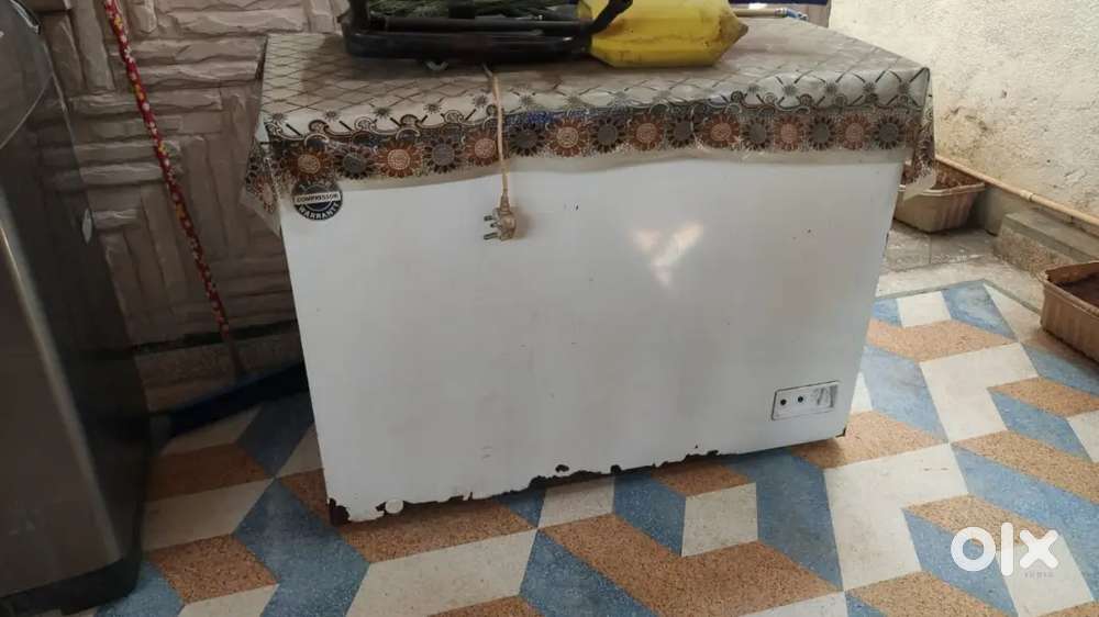 Deep fridgeer and steel table