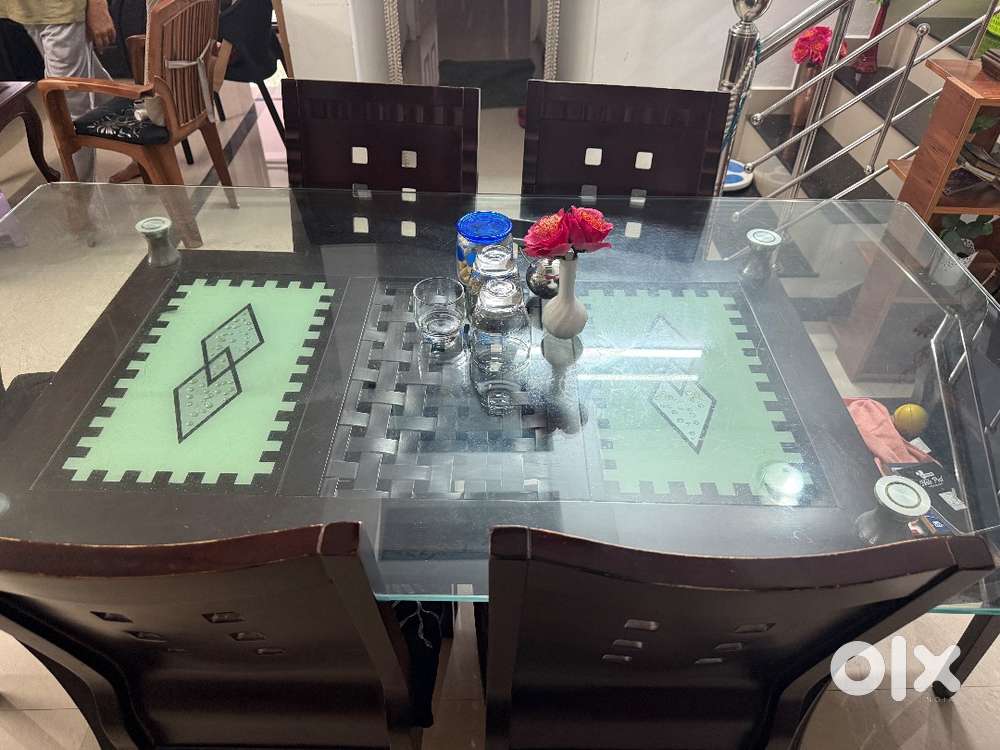Glass top dining table with 6 chairs