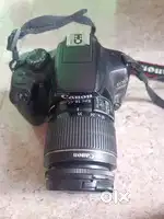 Canon EOS 1300D camera with lance