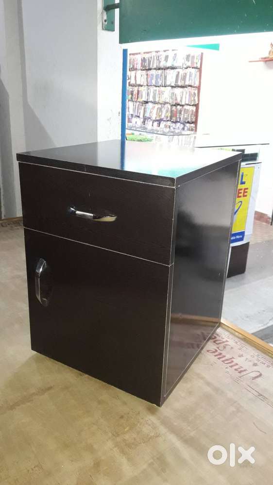 Bed Side Table  Utility cabinet besides bed
