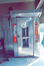 42 tray oven in good condition with 4 trolly