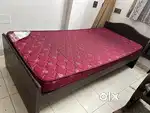 Single bed with mattress for sale.