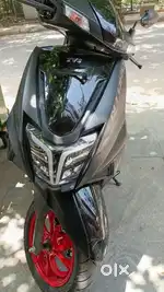 Showroom condition new scooty I want to exchange with car any  model