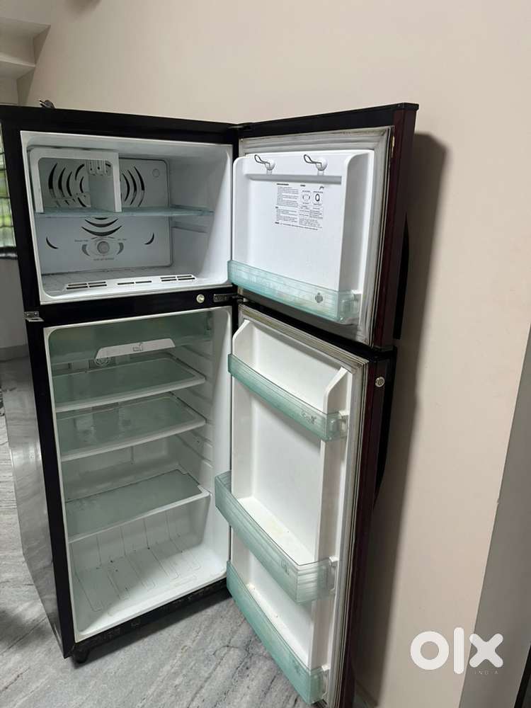 Godrej double door 265 litres( meroon colour)