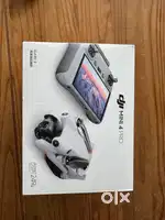 DJI Mini 4 Pro Camera Drone (with RC 2 Remote)