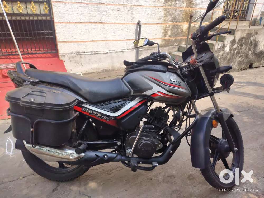 Red and white look bike Full insuranced vehicle and good condition