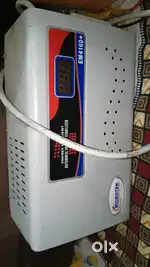 This image shows a Microtek EM4160+ Automatic Voltage Stabilizer. 