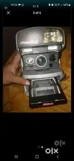 Polaroid 600 round instant camera