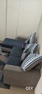 Good condition L-shaped sofa &  Cushions. Also matching colour carpet.
