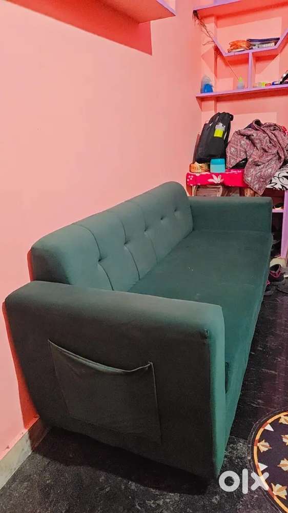 Beautiful green sofa fully new just 4months old