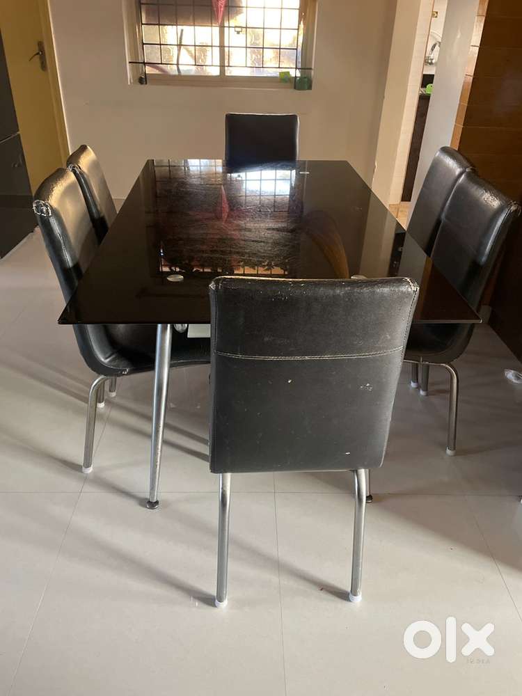 Dining table with 6 chairs and Top load washing machine LG make fuzzy