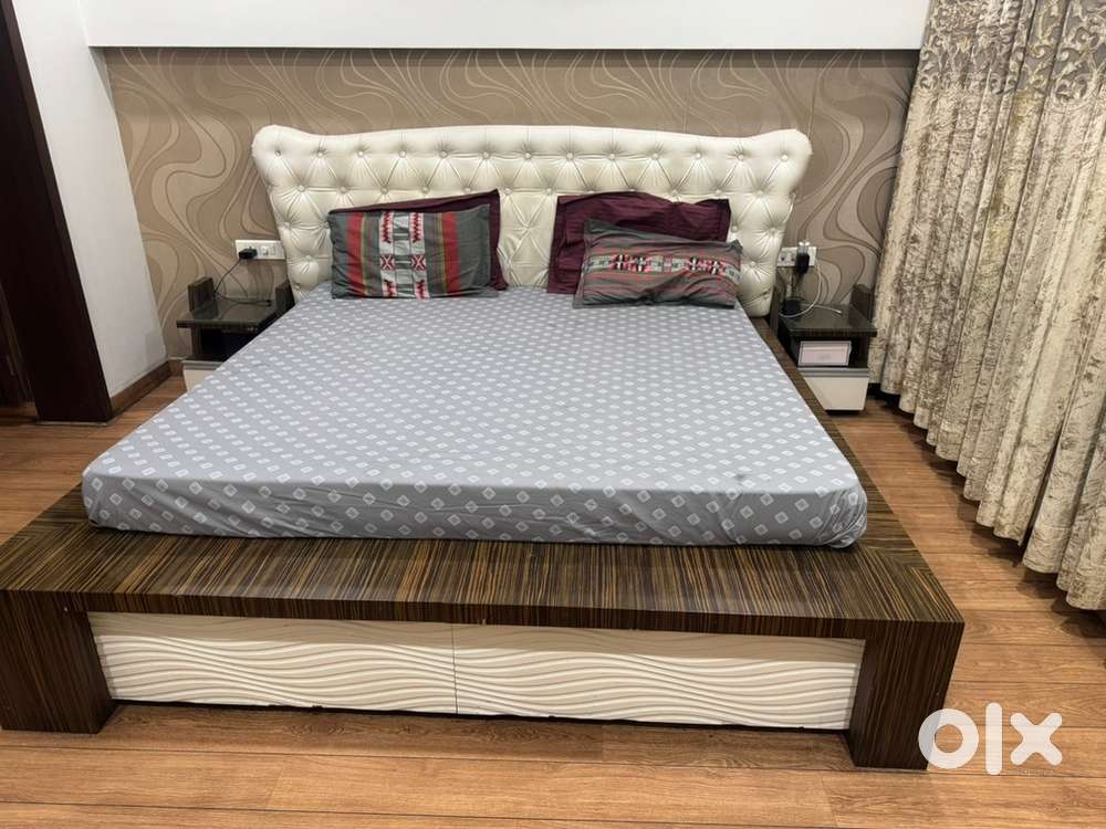 Bed with side drawers