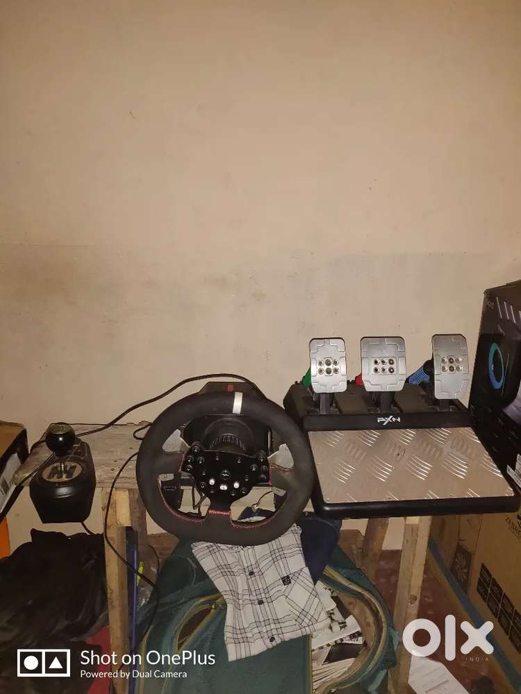 Steering wheel with gear shifter and pedal