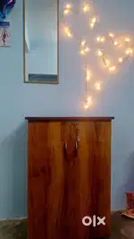 Small wooden Almira with shelves.