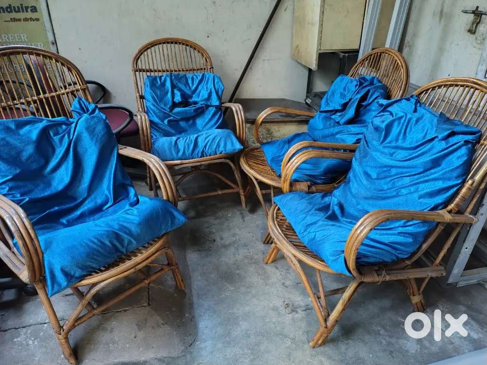 8 Cane Chairs and 1 Teapoy