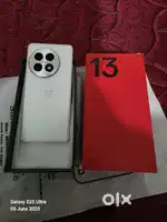 One plus 13 5g white 16gb 512gb 7 months old in mint condition