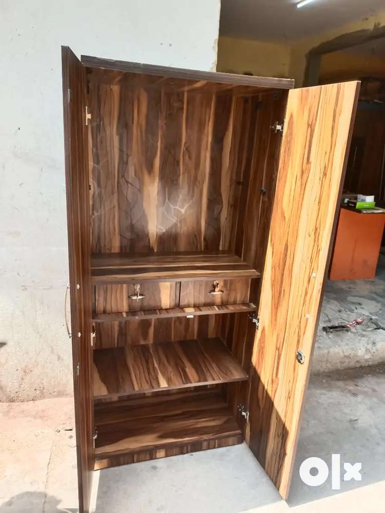 Brand new 2 door wardrobe with double drawers with extra shelves