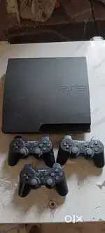 PS3 slim with 3 controllers and games