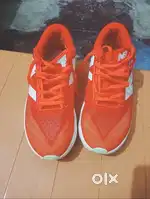 New -balance shoes in red colour