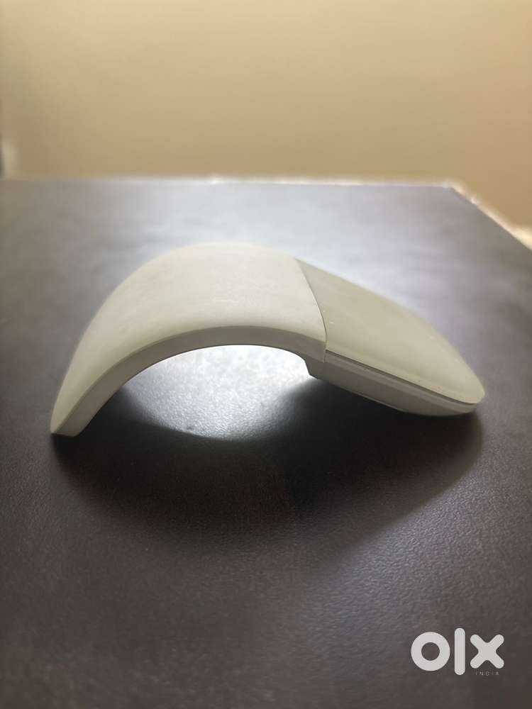 Surface arc mouse