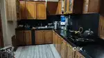 Kitchen Cabinets with SS fitting in teak wood with Aqua guard RO