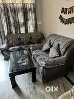 7 seater sofa and glass table