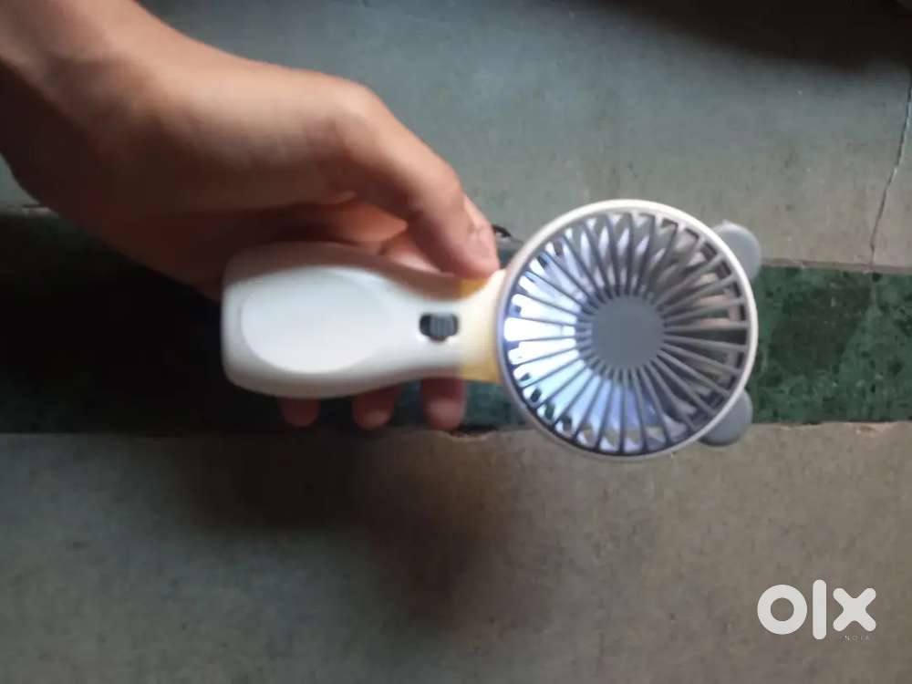 Mini fan 1 month warranty and usable and stylish two mode in fan thank