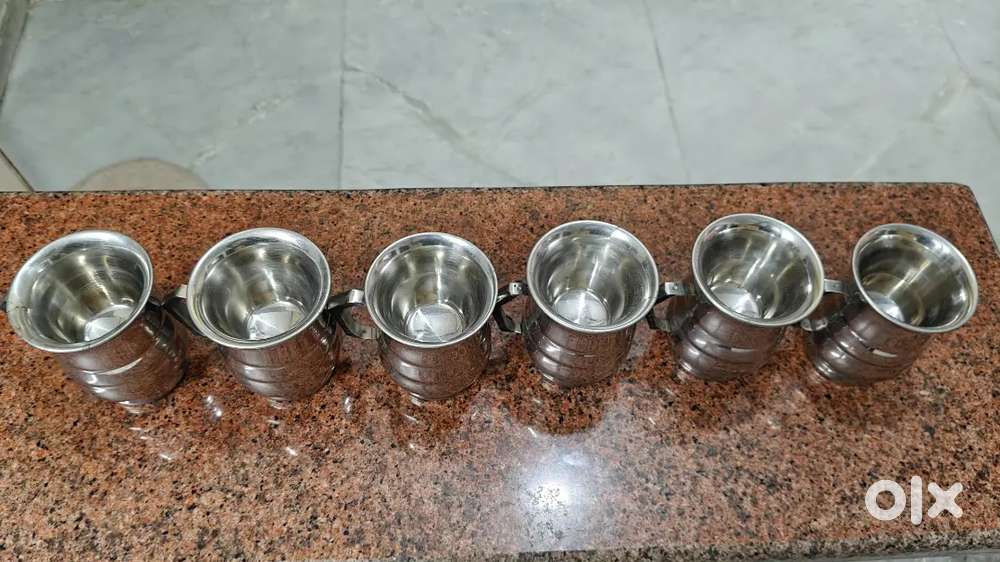 A set of 6 steel cups