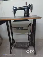 Sewing machine with cover