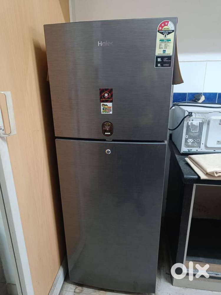 Fridge, Double Bed, Single Bed and Dining table