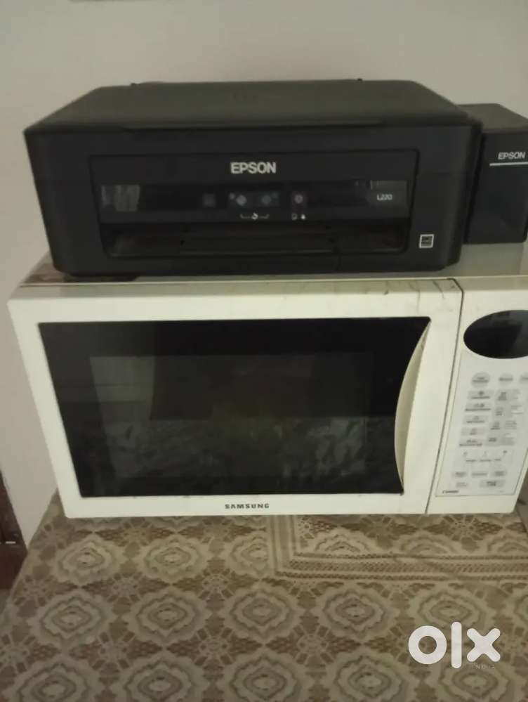 For sale used and repairable Micro Oven and printer cum copier.