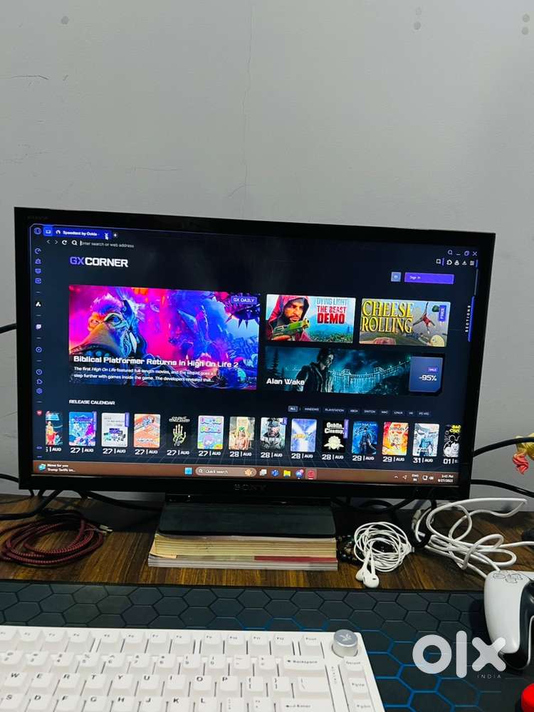 22-Inch Sony Bravia TV with Sound System & Elegant Brown Table.