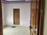 A single room with attached bathroom and complete ventilation .